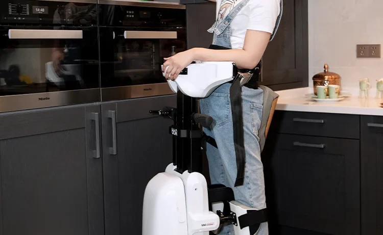 woman standing on intelligent transfer wheelchair